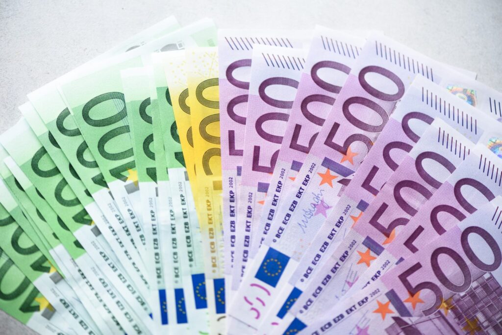 Euro currency money banknotes background. Payment and cash concept. Announced cancellation of five