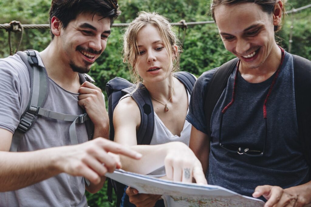 Friends finding their way with a map