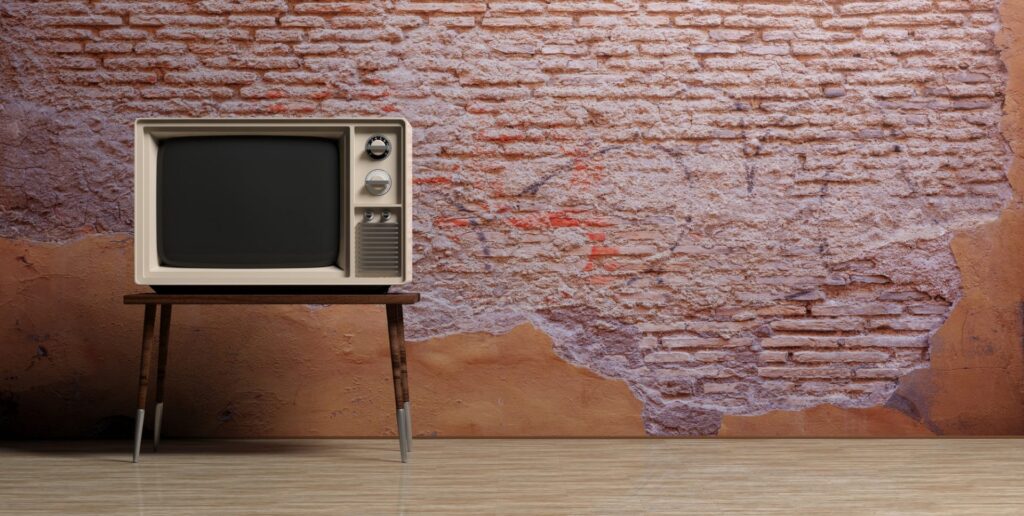 Vergeet die teleprompter - handige tips voor een werkbaar alternatief 1 Vintage TV in an empty room. 3d illustration