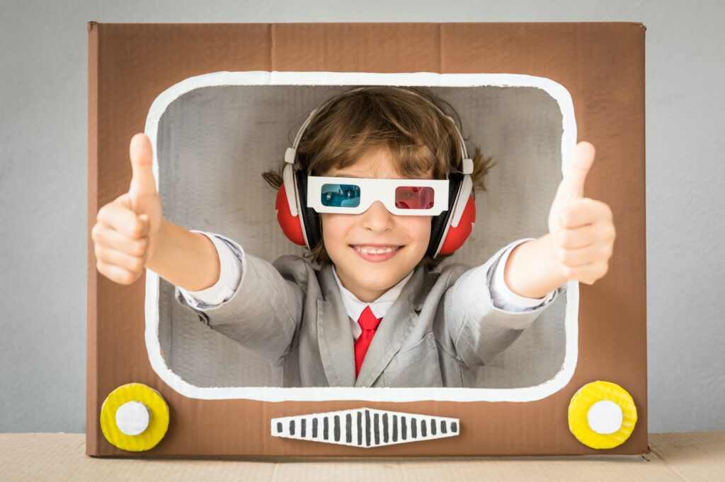 Child playing with cartoon TV
