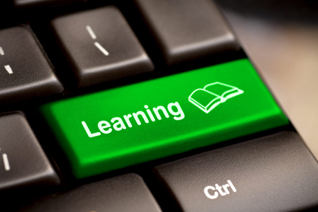 Coaching Online Leeromgeving 1 E-Learning Concept. Computer Keyboard