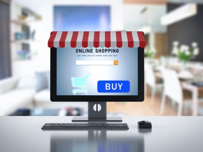 online shopping concept with 3d rendering desktop computer and awning