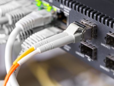 close-up-of-high-speed-fiber-network-switch-and-cables-in-datacenter