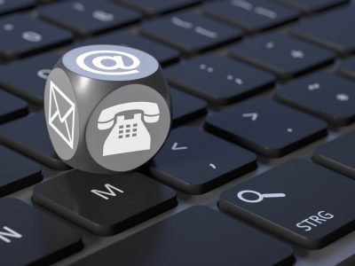 cube-with-signs-for-email-phone-and-letter