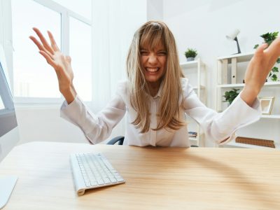 Evil irritated screaming adorable blonde businesswoman worker freelancer made critical mistake in