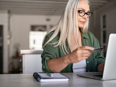 mature-woman-doing-online-payment