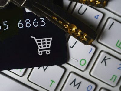 online-shopping-credit-card-and-keys-on-white-laptop-keyboard-e-commerce