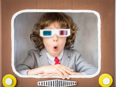out-of-focus-child-playing-with-cartoon-tv-PMQVKSM-cropped