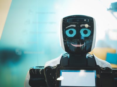 Smiling robot assistant with artificial intelligence in a public place
